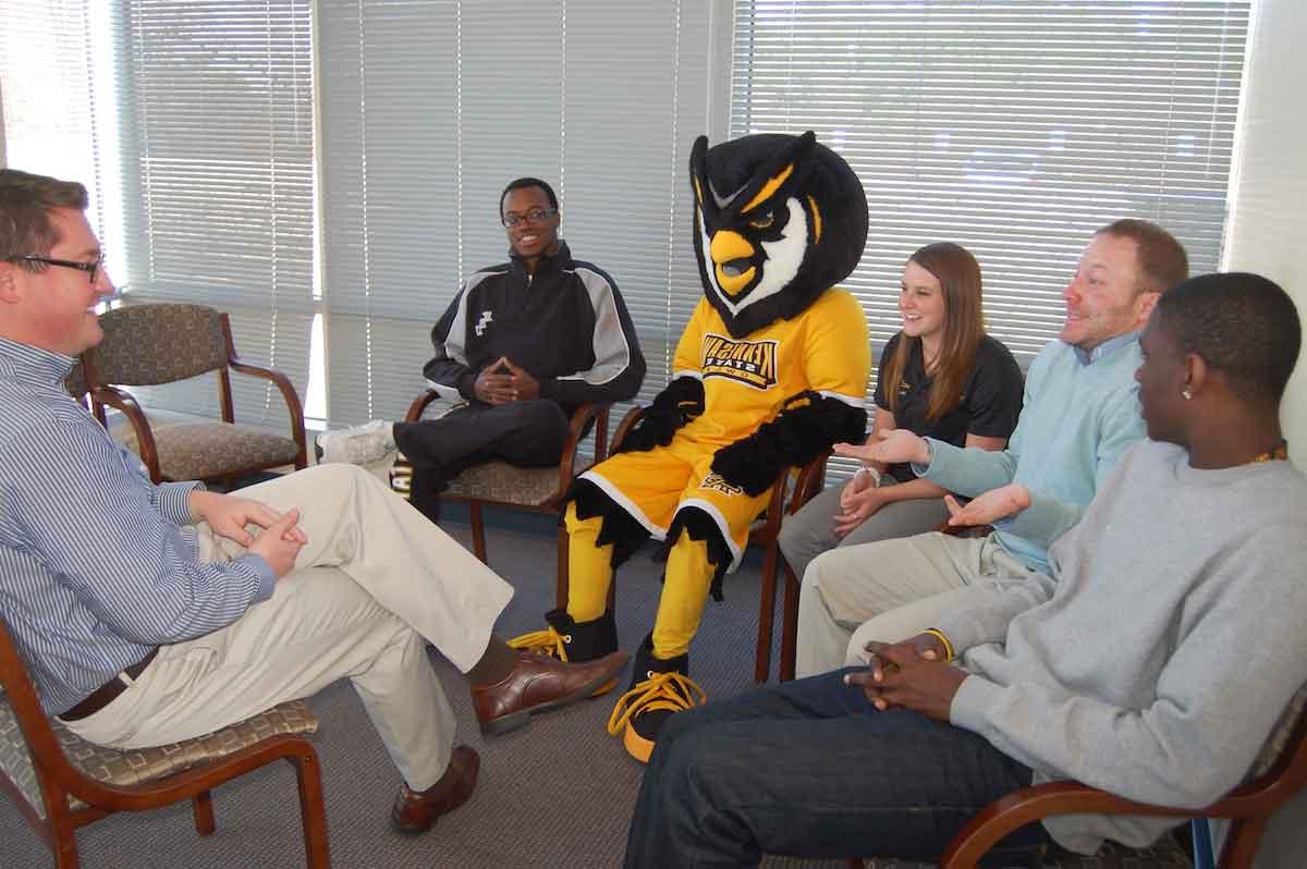 scrappy and students in group counseling