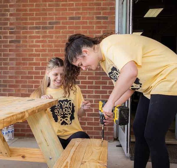 students constructing a table