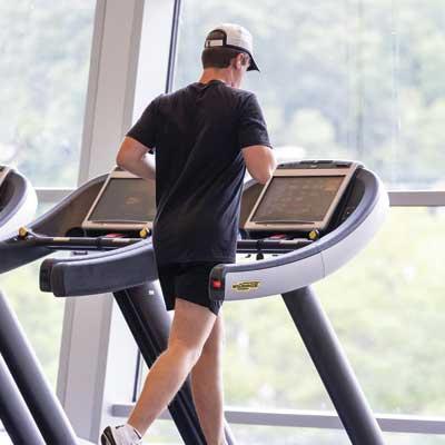 student running on a treadmill